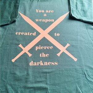 Green Graphic Tee with Swords Design